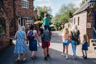 Close Up Of Family Walking Down A Road At Blists Hill Victorian Town 09 23