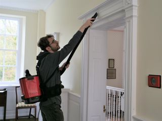 A Volunteer Hoovering In The Darby Houses Prior To Reopening 03 2024